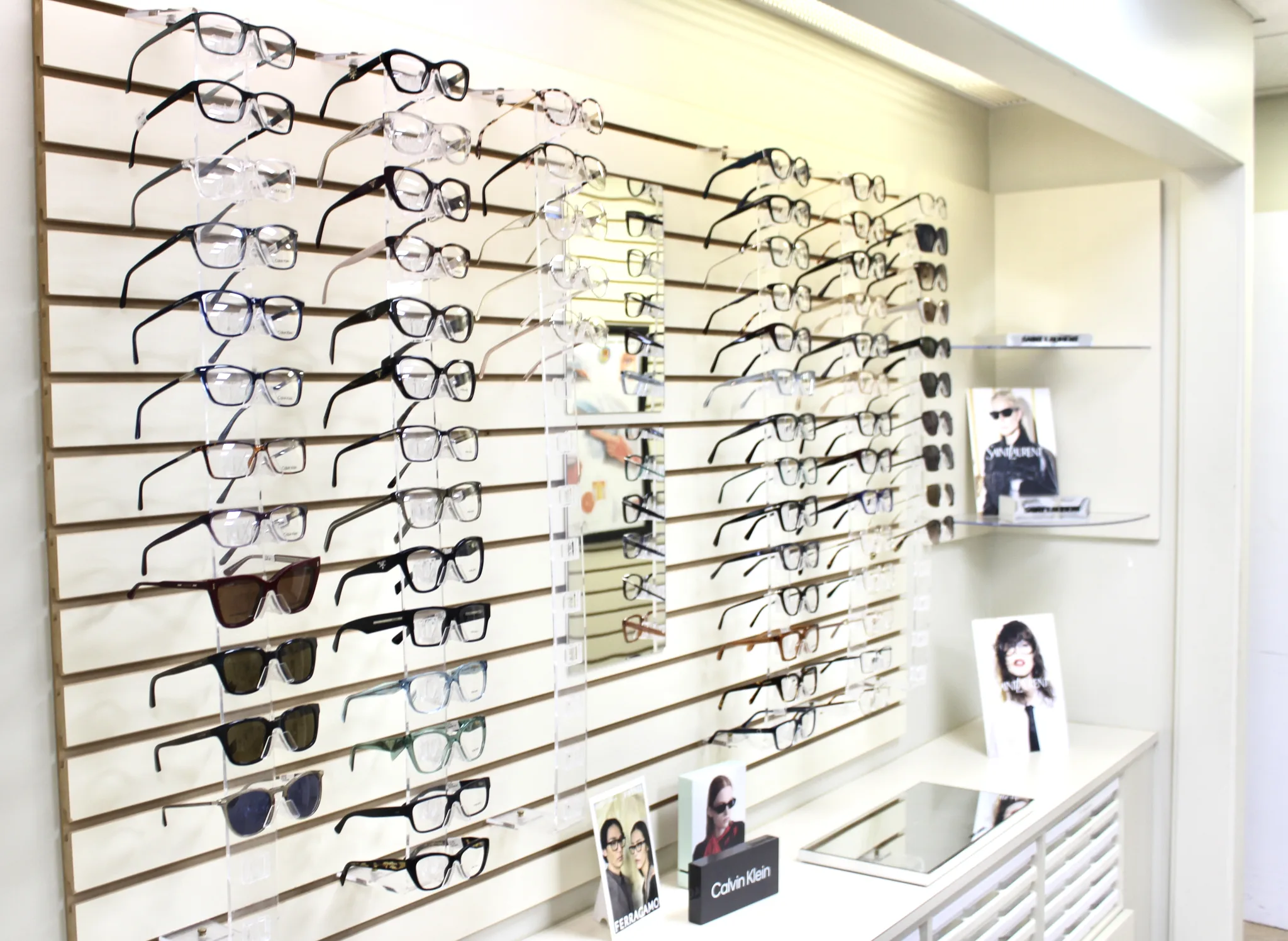 Eyeglass frames displayed in the Cranston optical showroom.