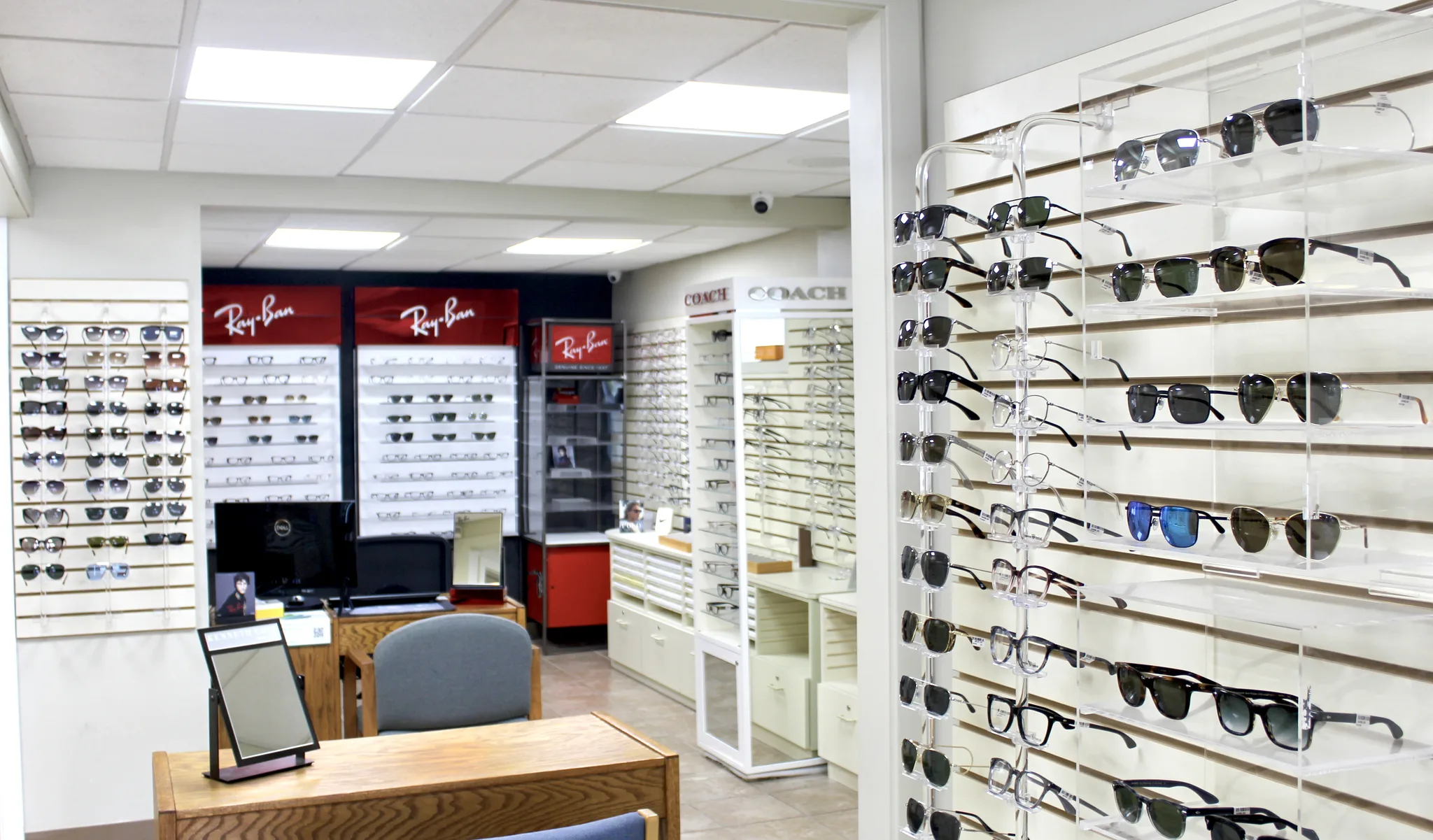 Cranston optical showroom with eyeglass and sunglass displays.